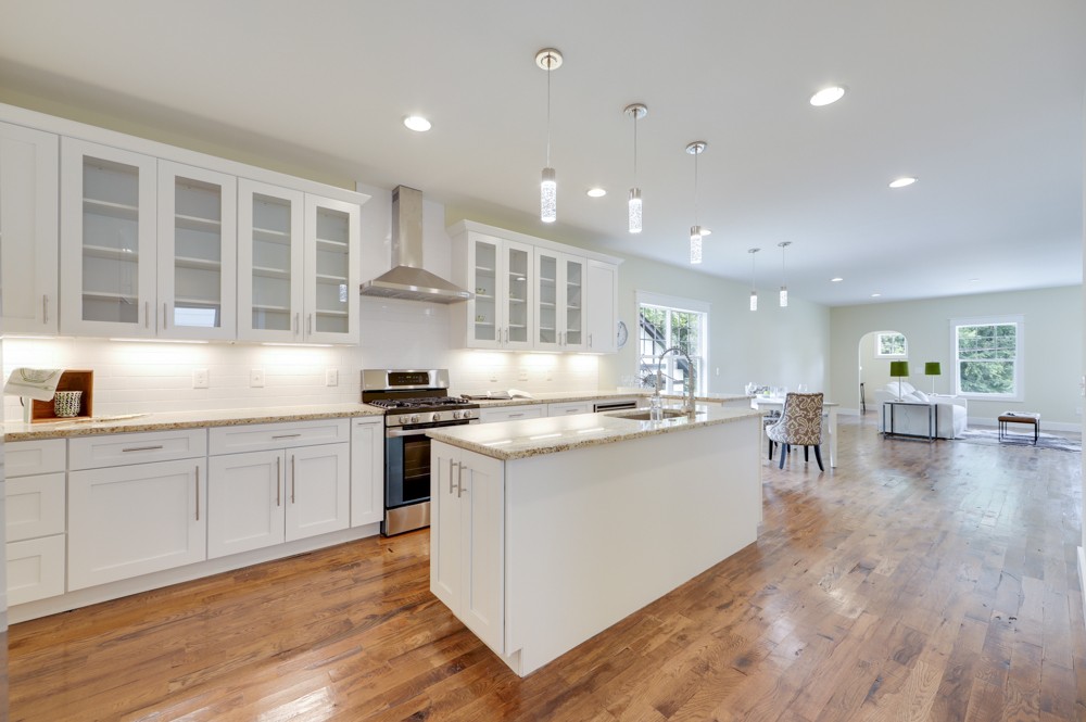 1332 B Lischey Avenue Nashville, TN 37207 - Photo 15 of 40 a kitchen with stainless steel appliances granite countertop a stove and a sink