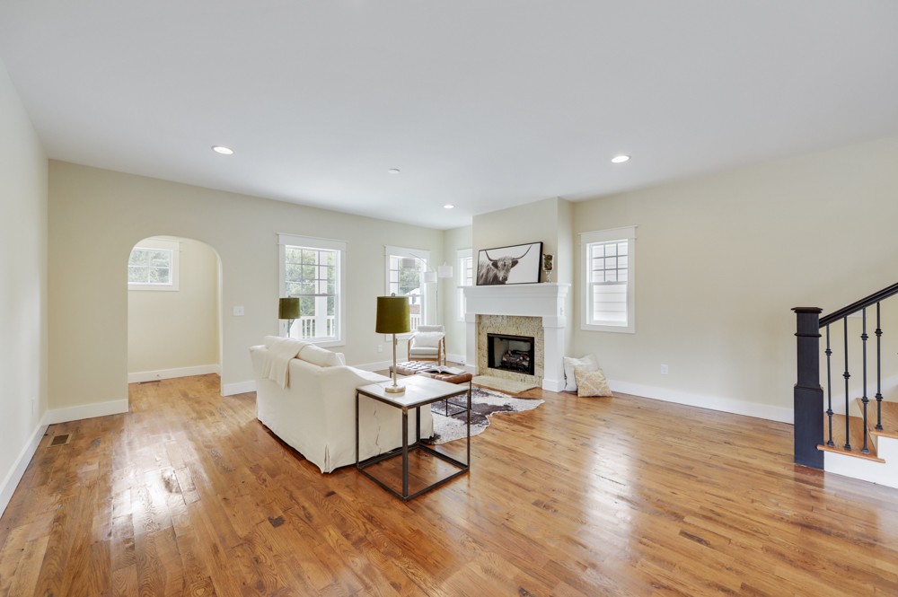 1332 B Lischey Avenue Nashville, TN 37207 - Photo 19 of 40 a living room with fireplace furniture and a wooden floor