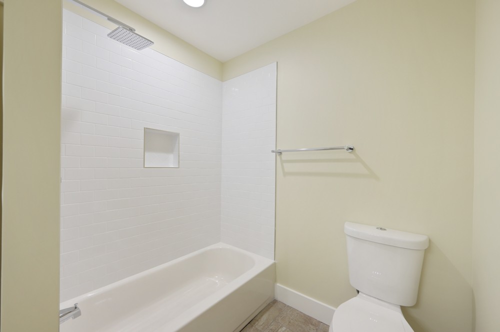 1332 B Lischey Avenue Nashville, TN 37207 - Photo 24 of 40 a bathroom with a toilet and bathtub