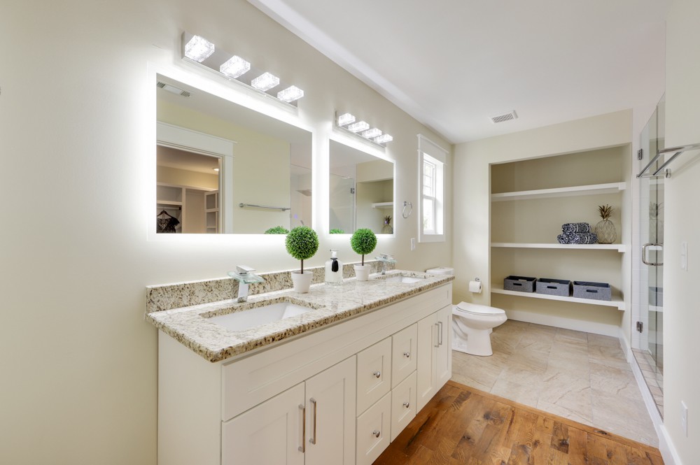 1332 B Lischey Avenue Nashville, TN 37207 - Photo 34 of 40 a bathroom with a sink double vanity and a mirror