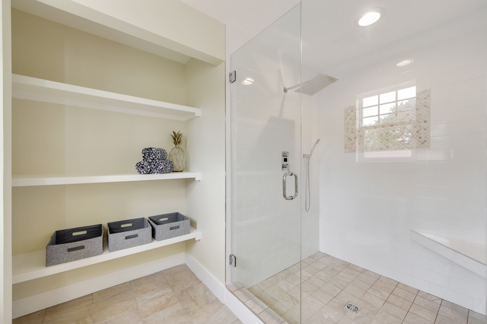 1332 B Lischey Avenue Nashville, TN 37207 - Photo 37 of 40 a room with a walk in closet and a mirror