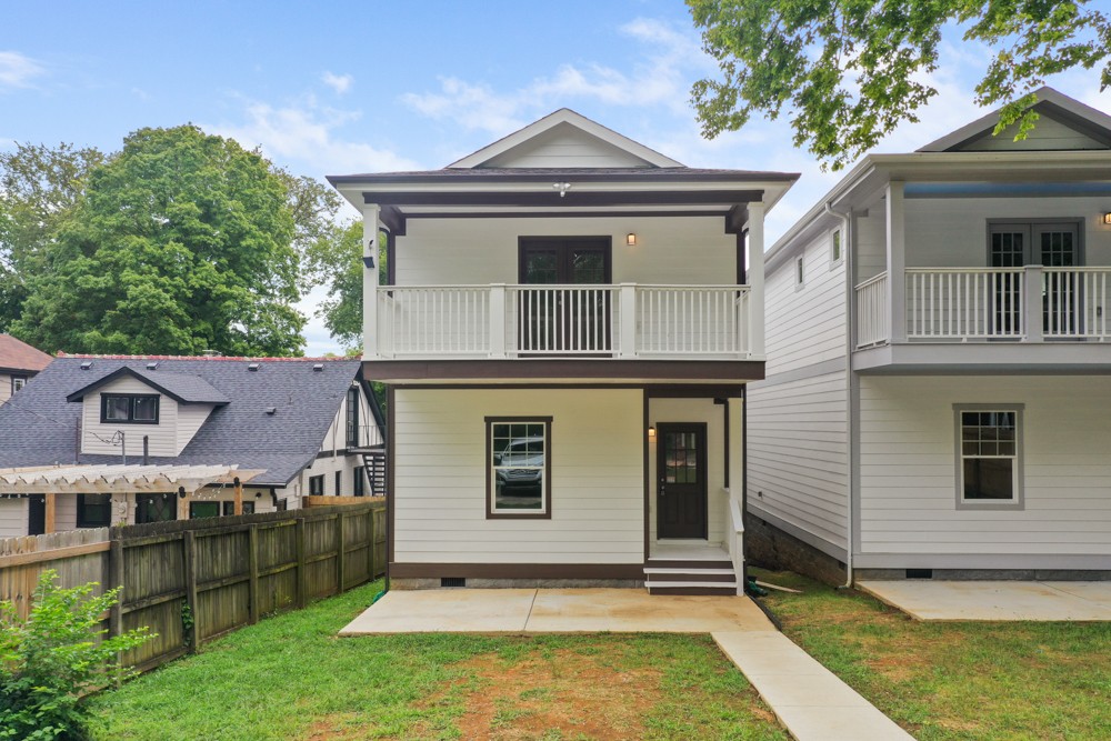 1332 B Lischey Avenue Nashville, TN 37207 - Photo 39 of 40 a front view of a house with a yard