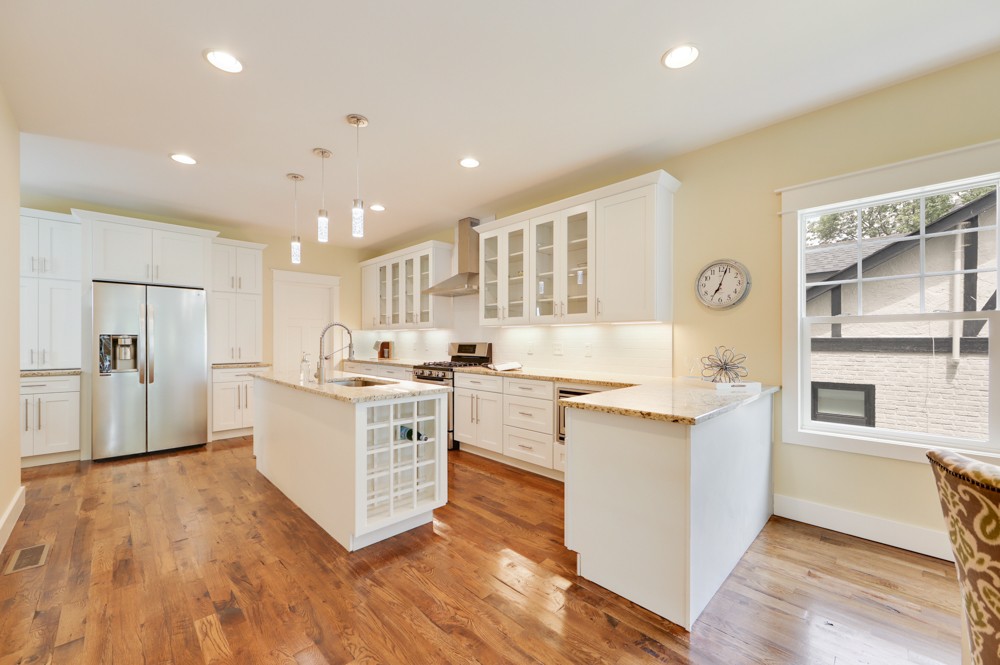 1332 B Lischey Avenue Nashville, TN 37207 - Photo 8 of 40 a large kitchen with a lot of counter space and wooden floor