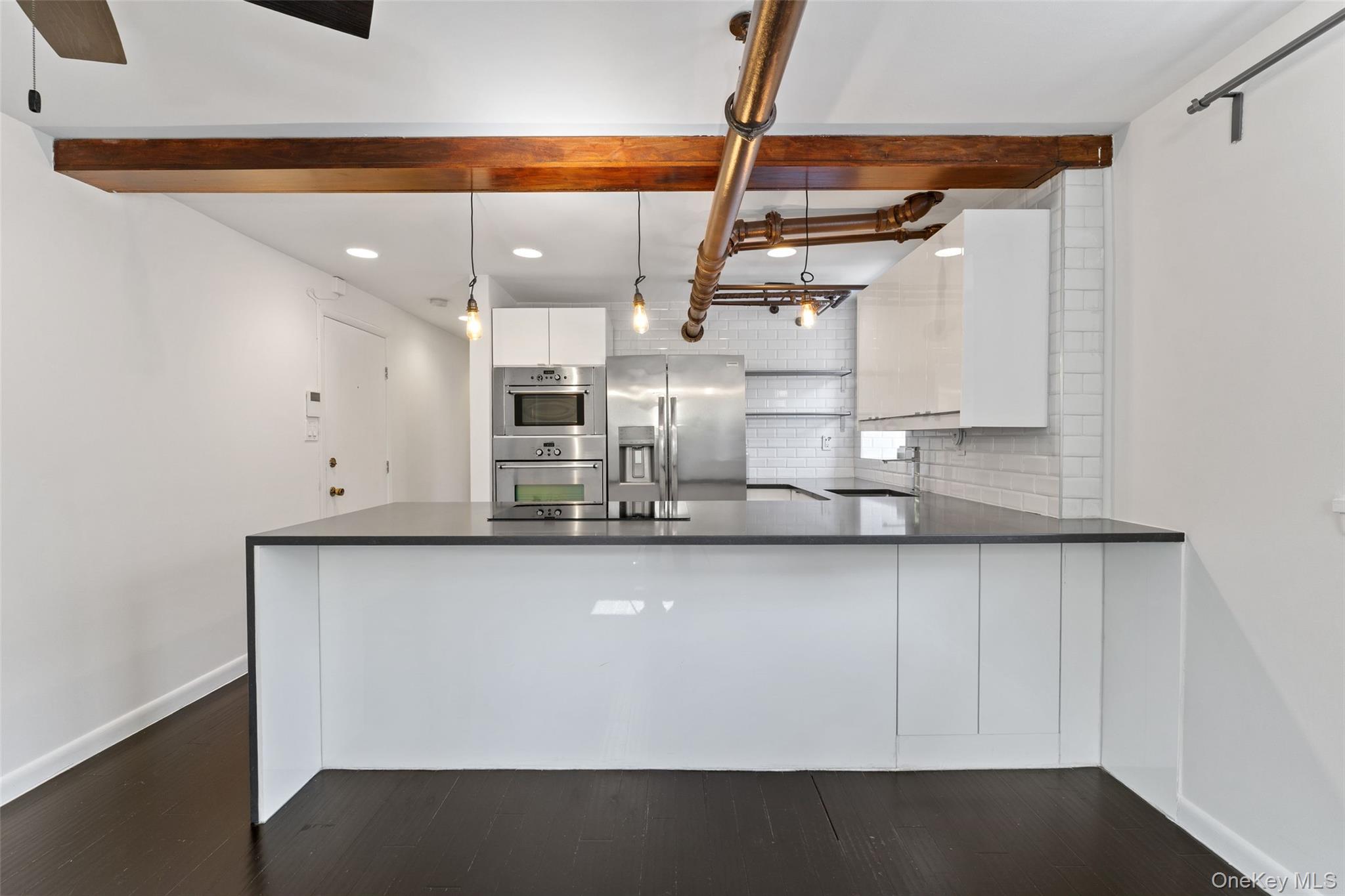 56 Pondfield Road West, Unit A Bronxville, NY 10708 - Photo 8 of 24 a kitchen with counter top space and cabinets