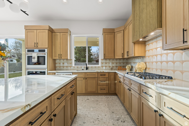 226 East 1100 North Hurricane, UT 84737 - Photo 21 of 49 Kitchen with white double oven, light stone counters, tasteful backsplash, stainless steel gas stovetop, and recessed lighting