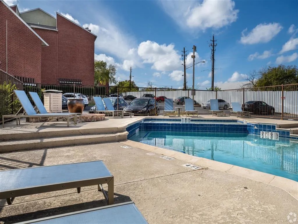 7610 Cameron Road, Unit 341 Austin, TX 78752 - Photo 38 of 42 a view of a swimming pool with outdoor seating