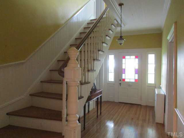 5111 Semora Road Roxboro, NC 27574 - Photo 3 of 25 a view of entryway and hall with wooden floor