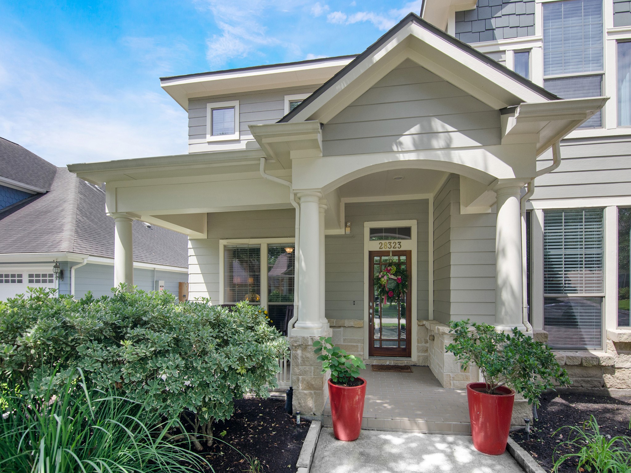 28323 Ryans Ridge Lane Spring, TX 77386 - Photo 39 of 45 Darling Homes is known for thoughtful design, and this inviting front porch is no exception!