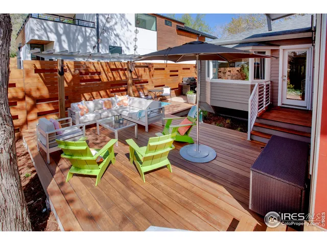 a dining room with furniture and a fireplace