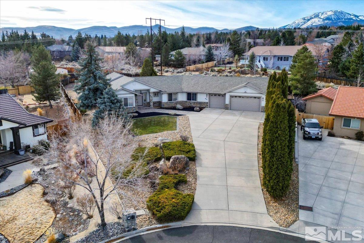 45 Water Lily Court Reno, NV 89511 - Photo 1 of 25 a view of a houses with a patio