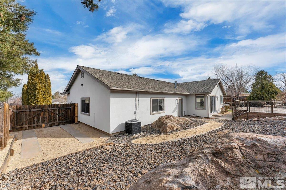45 Water Lily Court Reno, NV 89511 - Photo 20 of 25 a view of a house with a yard