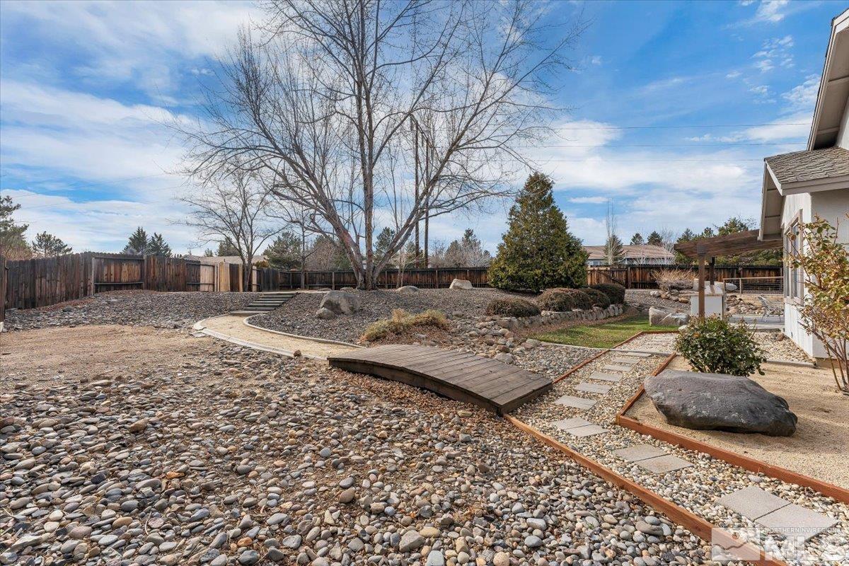 45 Water Lily Court Reno, NV 89511 - Photo 22 of 25 a view of a yard with a house