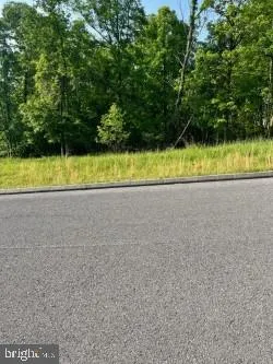 a view of a swimming pool and outdoor space