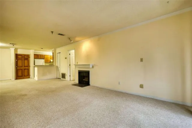 a living room with a fireplace