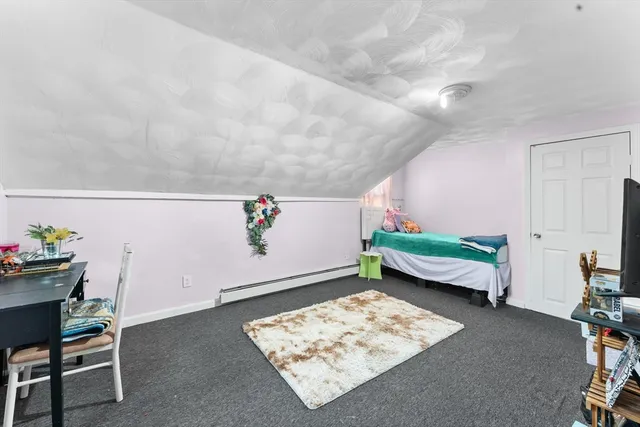 a room with furniture and a wooden floor