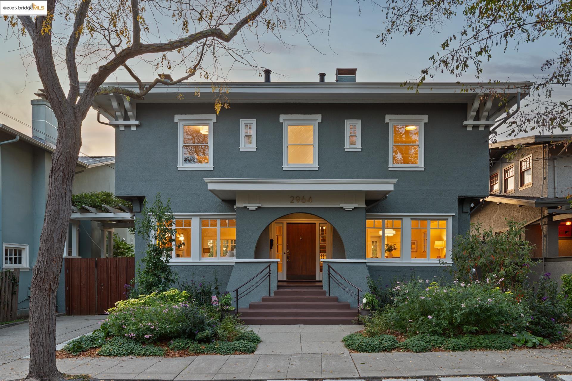 a view of a house with large windows