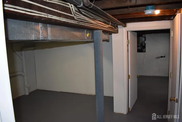 a view of a closet area with an empty room