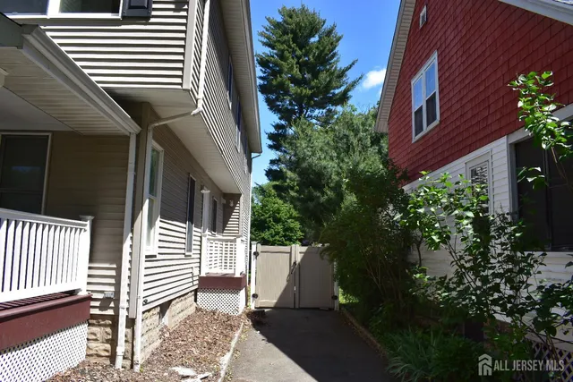 a view of a patio of a house with a deck