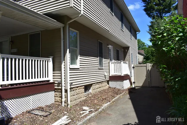 a view of backyard with deck and deck