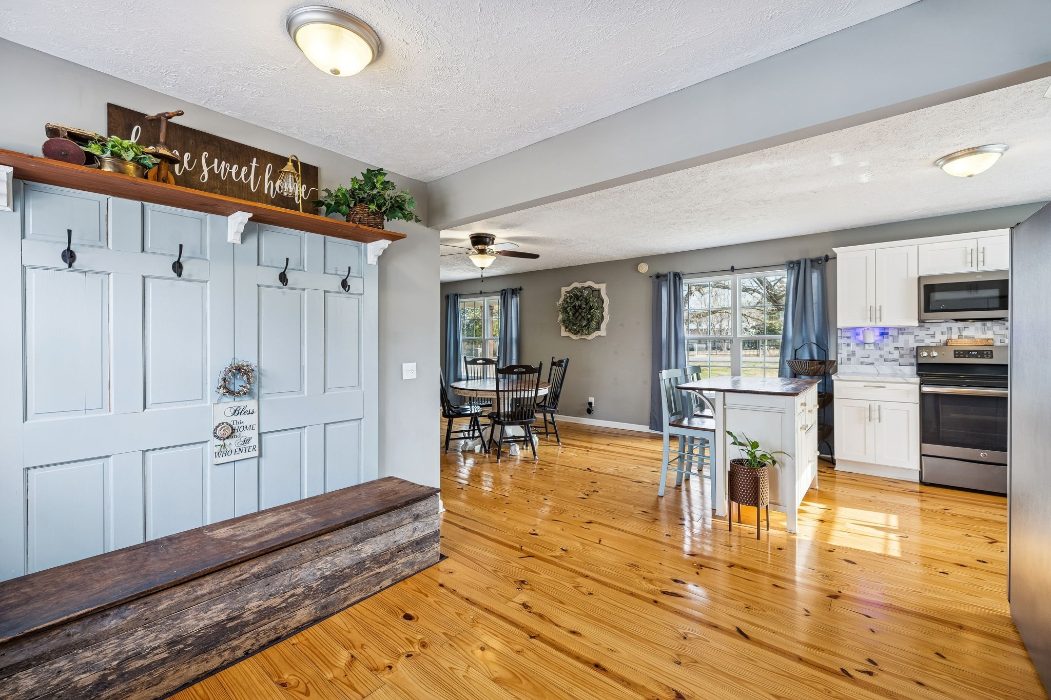 110 Ben Green Road Lebanon, TN 37090 - Photo 34 of 61 a large living room with stainless steel appliances granite countertop a couch and wooden floor