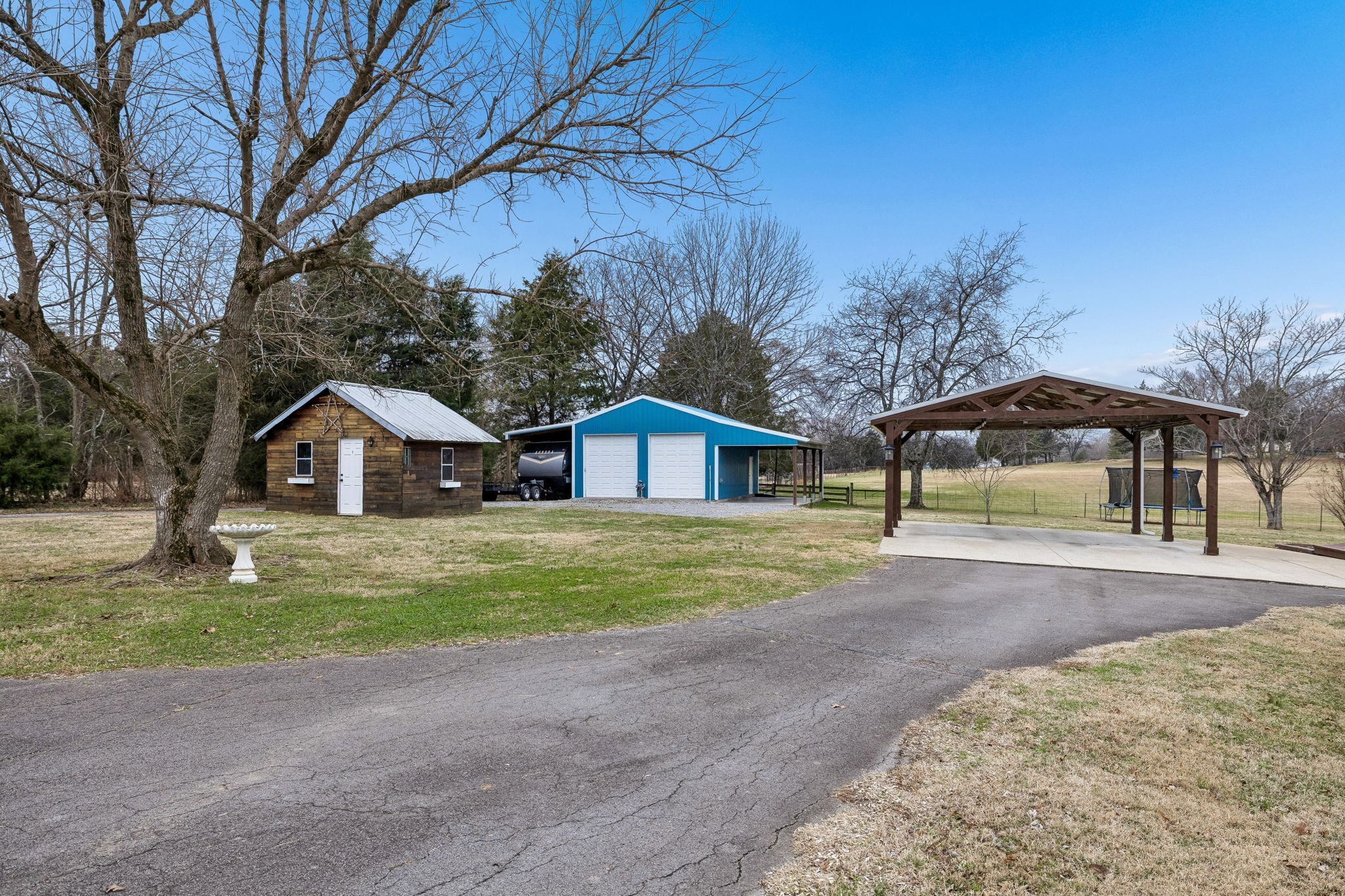 110 Ben Green Road Lebanon, TN 37090 - Photo 37 of 61 a front view of a house with a yard and garage