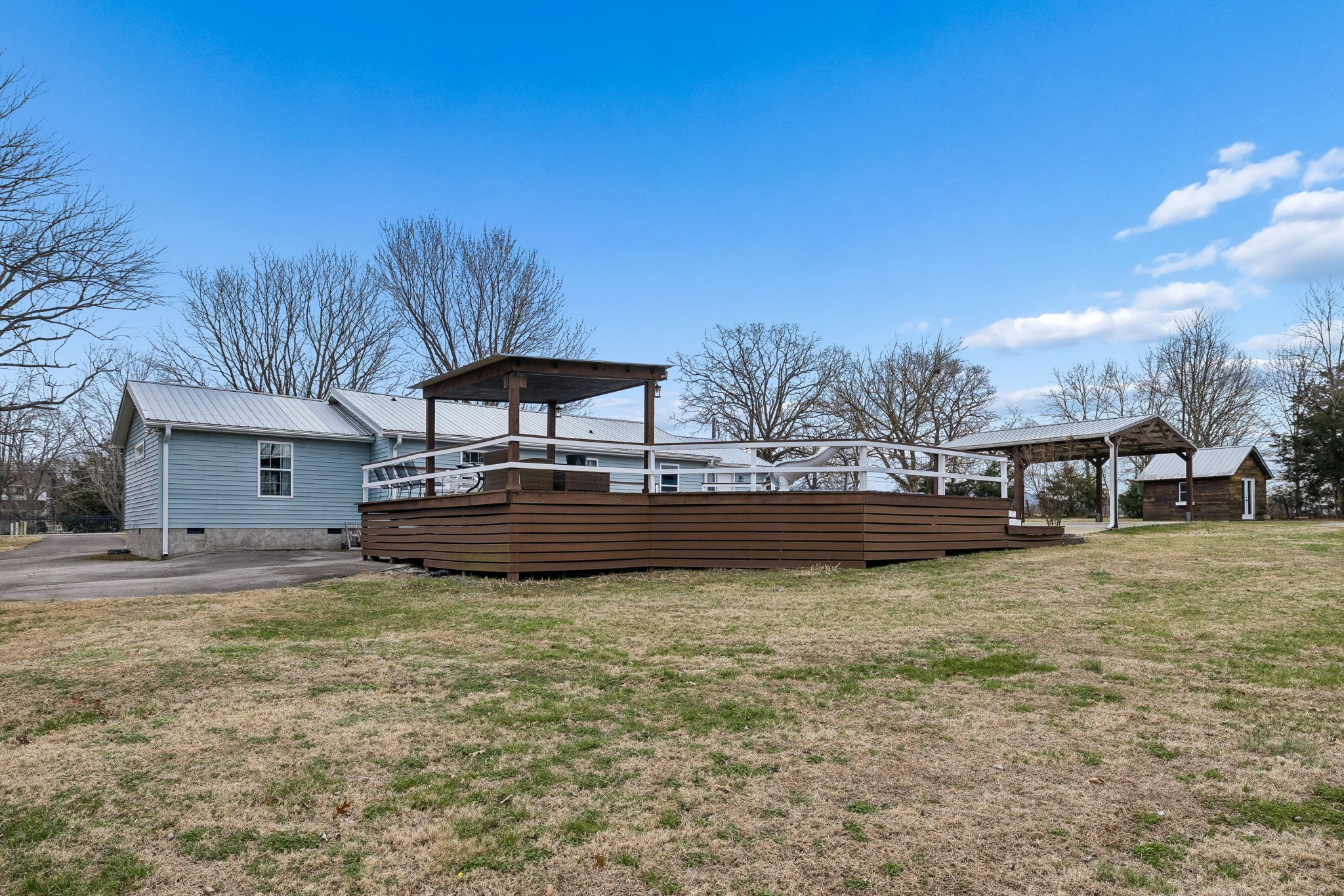 110 Ben Green Road Lebanon, TN 37090 - Photo 44 of 61 a view of a house with swimming pool and a yard