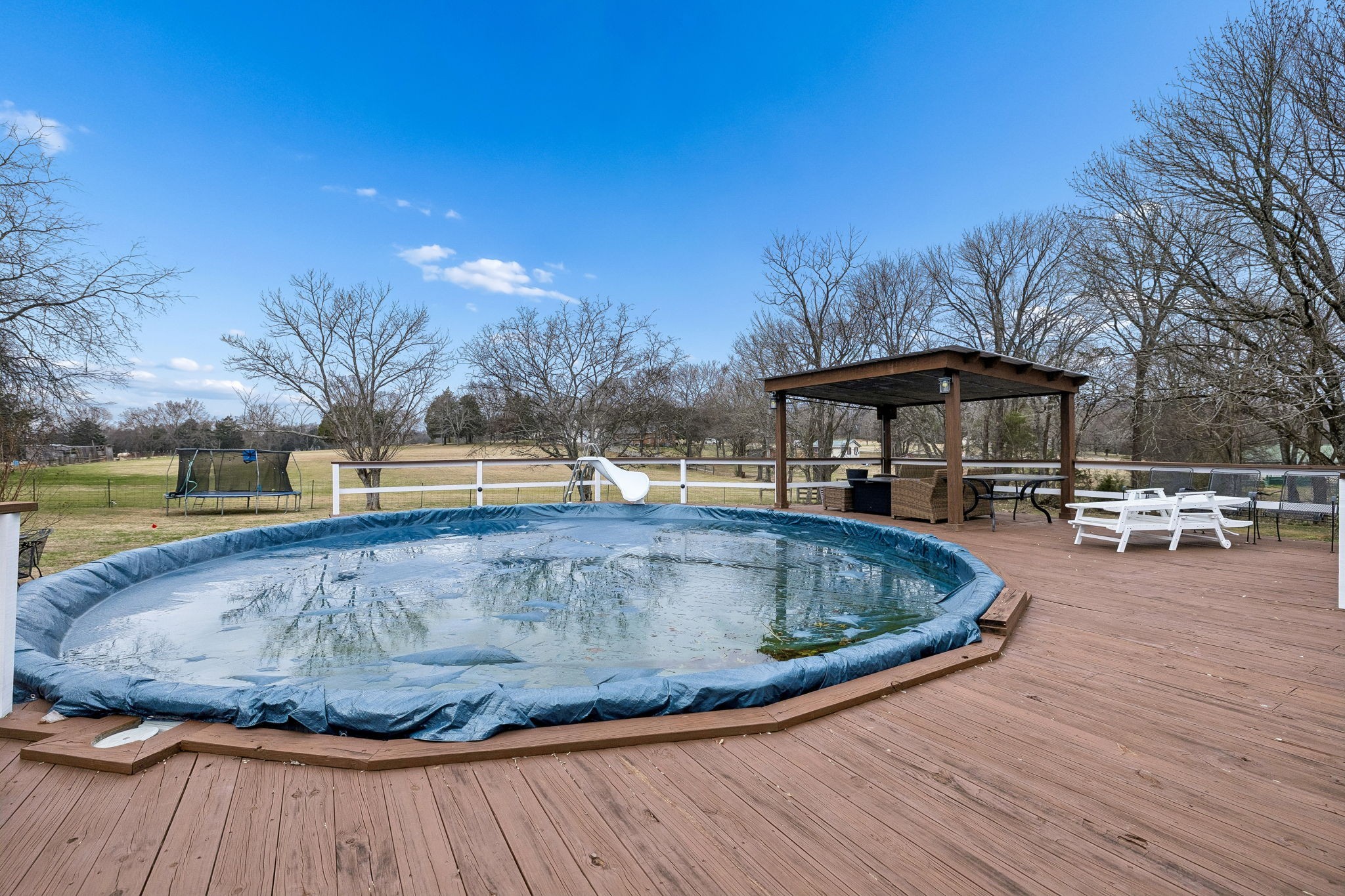110 Ben Green Road Lebanon, TN 37090 - Photo 48 of 61 a view of swimming pool with seating area and barbeque oven