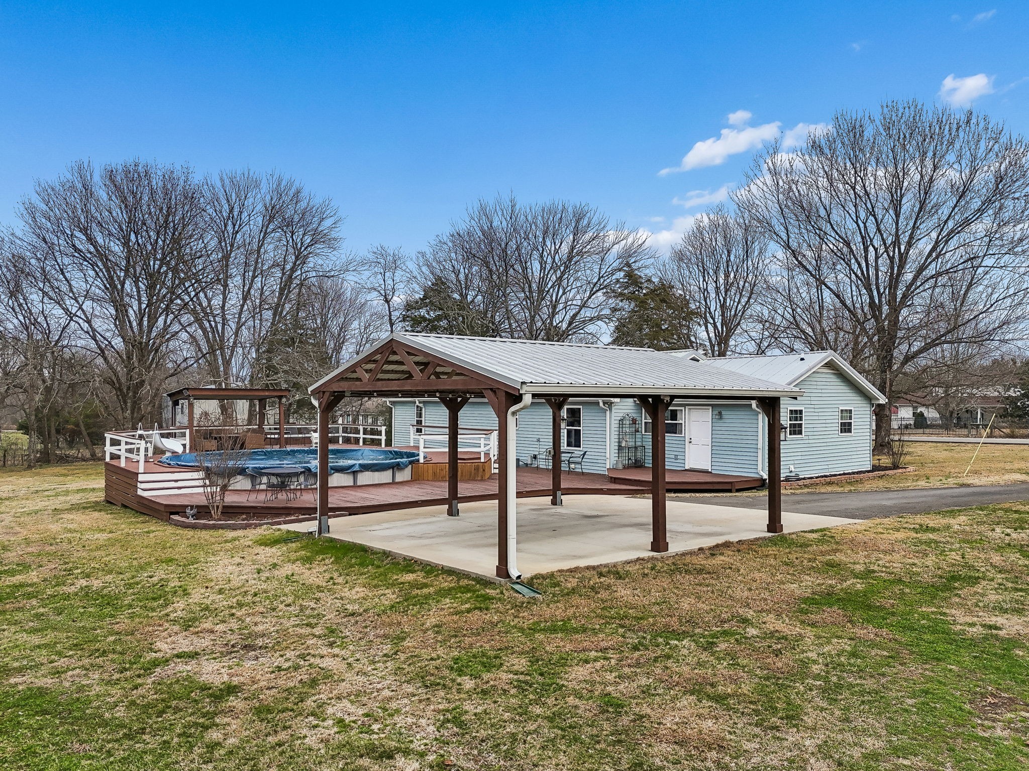 110 Ben Green Road Lebanon, TN 37090 - Photo 54 of 61 a wooden bench sitting in front of house with yard