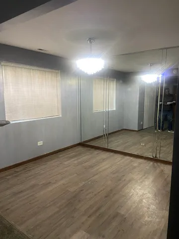 a kitchen with a refrigerator stove and microwave