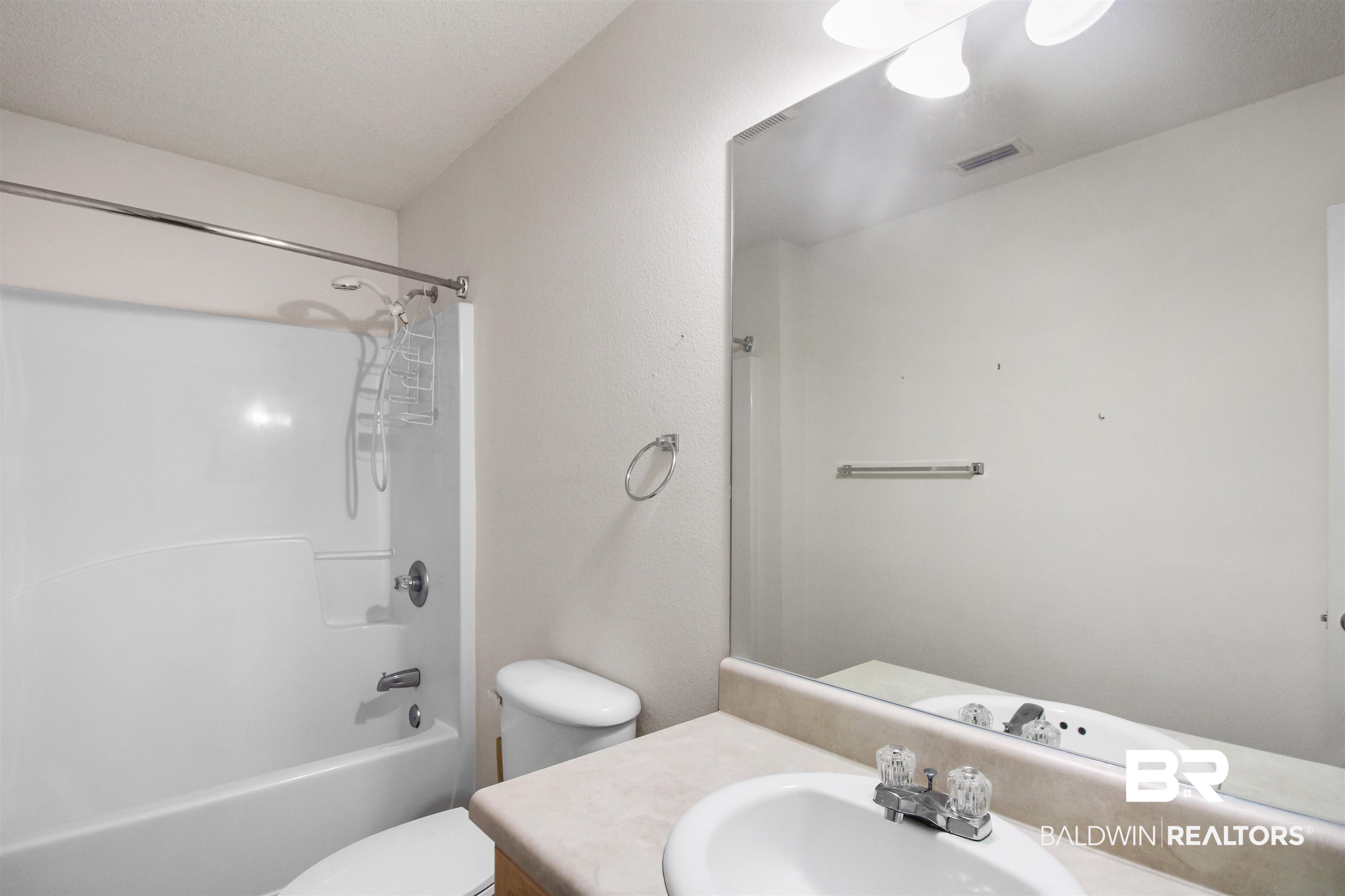 412 Collinwood Loop Foley, AL 36535 - Photo 12 of 23 Full bathroom with tub / shower combination, toilet, and vanity