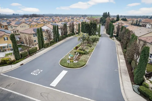 a view of a garden with a houses