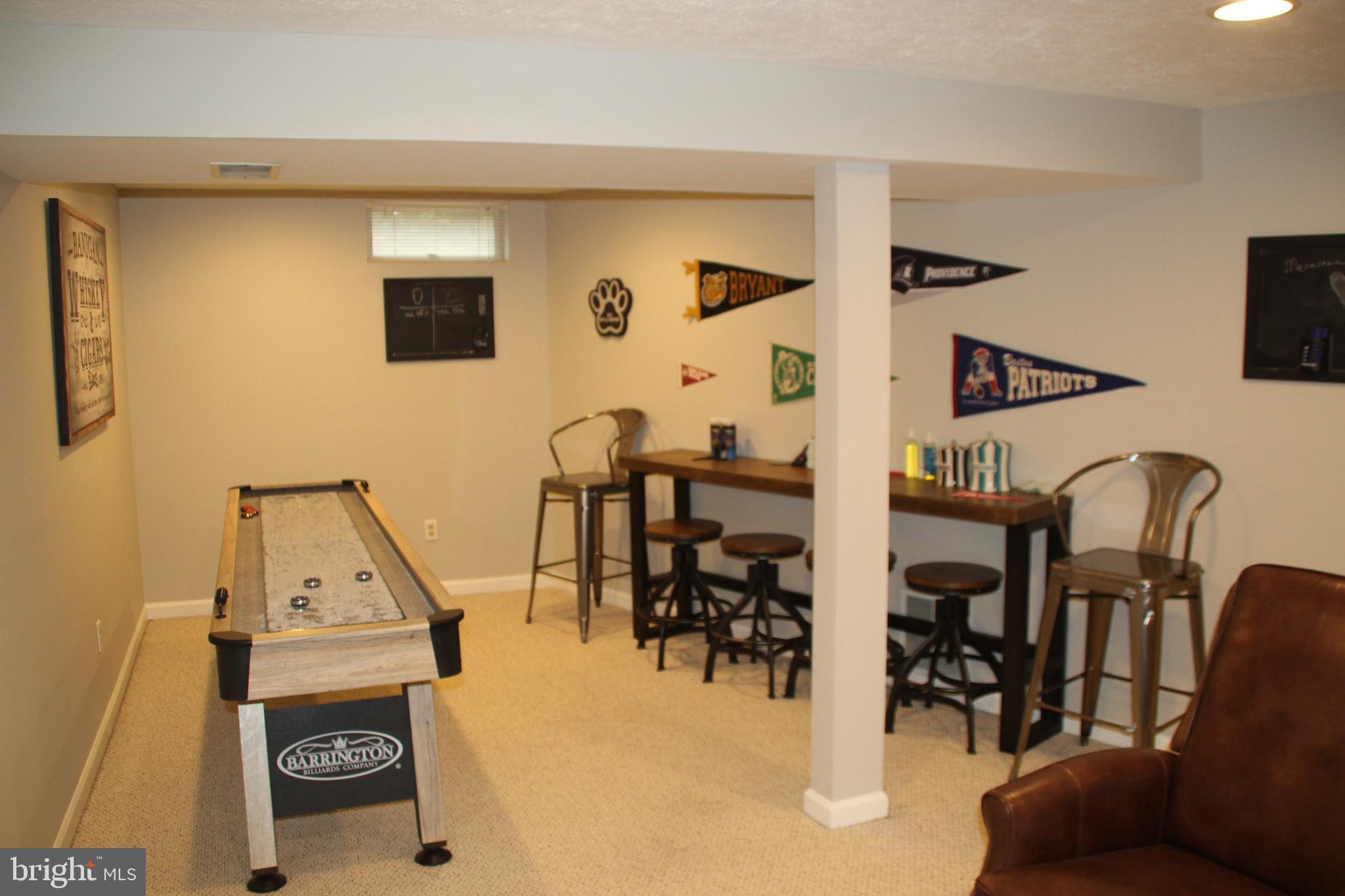 12507 Thunder Chase Drive Reston, VA 20191 - Photo 14 of 27 a living room with furniture and kitchen view