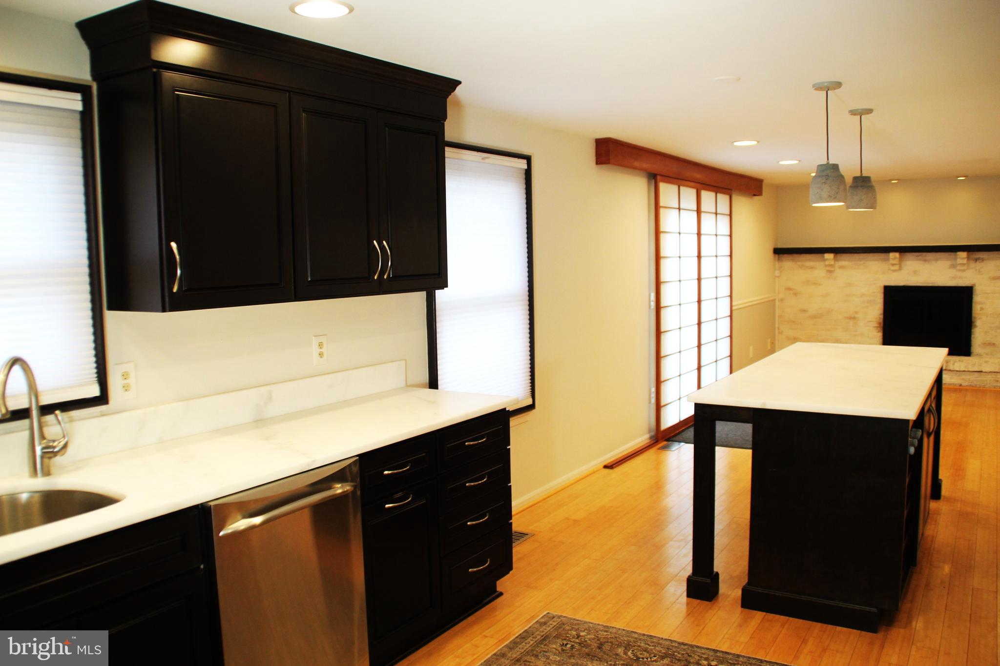 12507 Thunder Chase Drive Reston, VA 20191 - Photo 7 of 27 a kitchen with a sink and cabinets