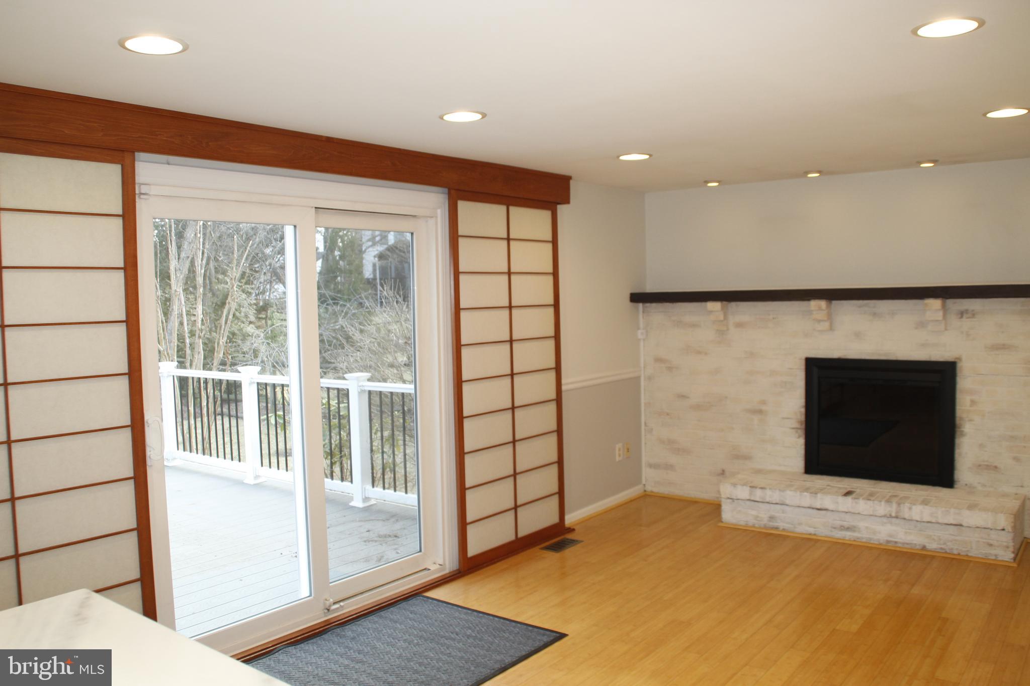 12507 Thunder Chase Drive Reston, VA 20191 - Photo 10 of 27 a living room with a large fireplace