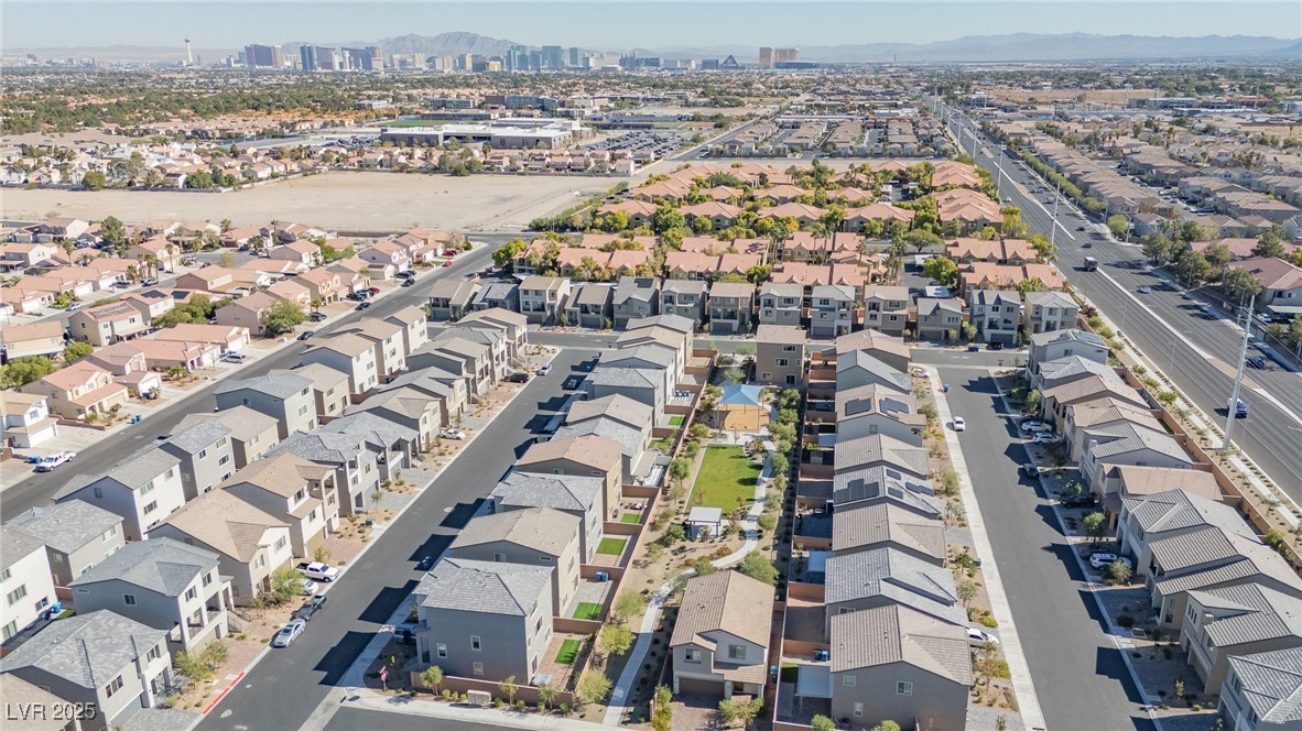 5646 Spring Trellis Street Las Vegas, NV 89113 - Photo 22 of 25 Aerial perspective of suburban area