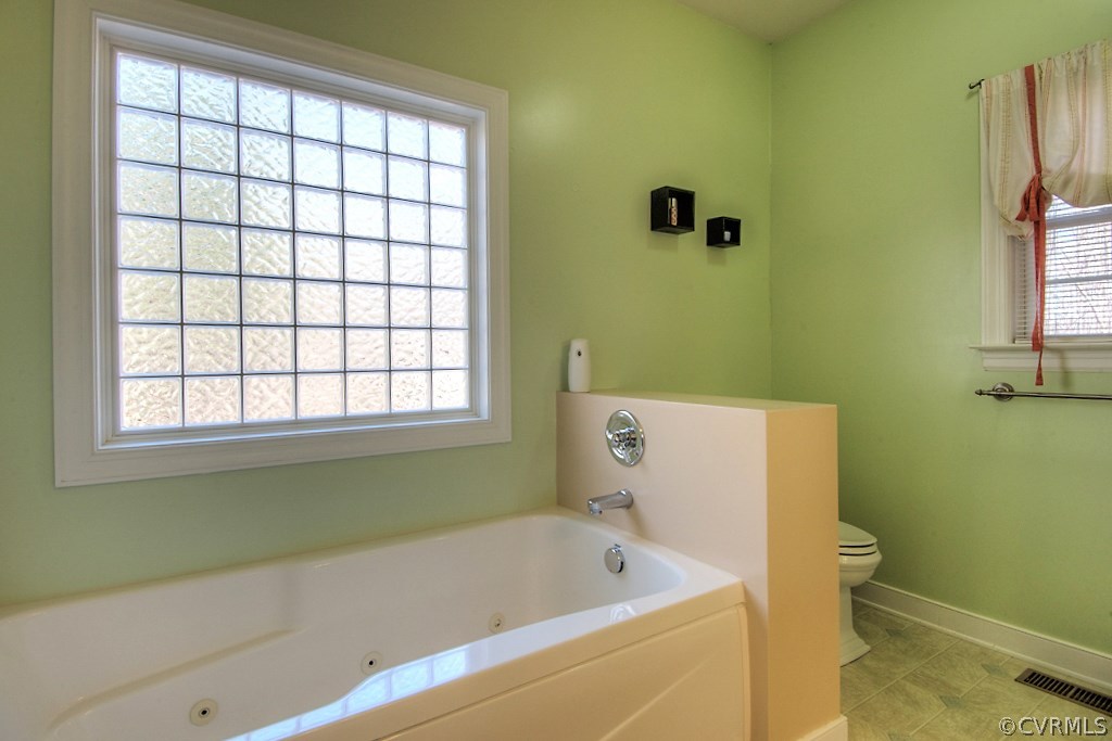 4488 Lockin Road Powhatan, VA 23139 - Photo 17 of 31 Featuring a jetted tub and stand up shower