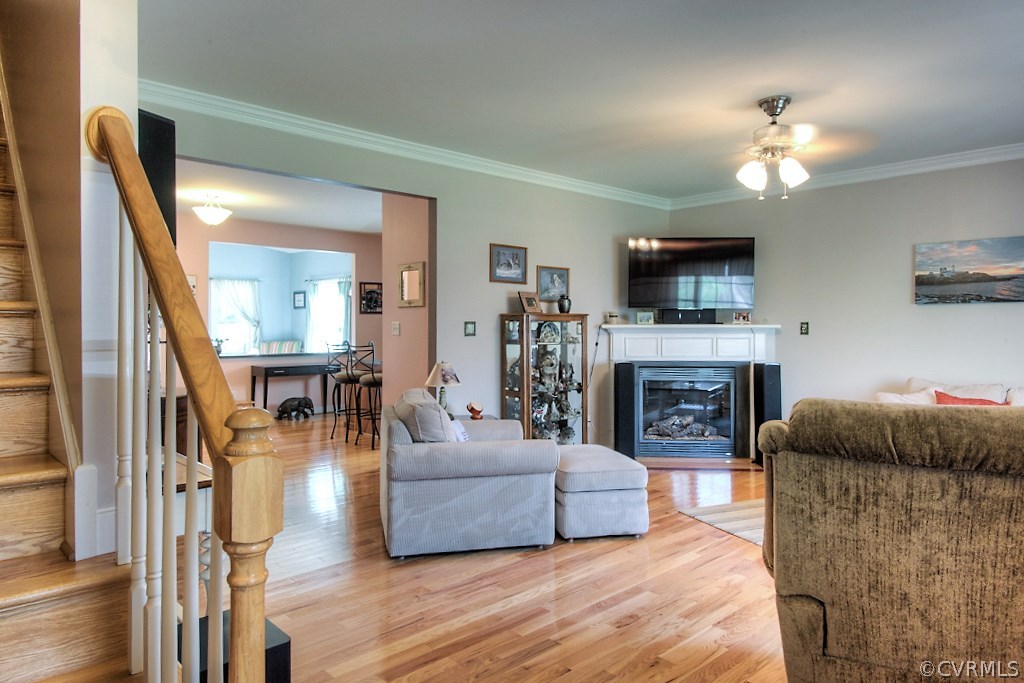 4488 Lockin Road Powhatan, VA 23139 - Photo 2 of 31 Living room features hardwood floors, corner gas f