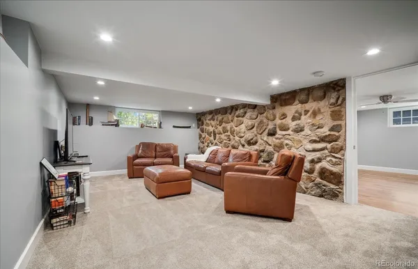 a view of a workspace with furniture