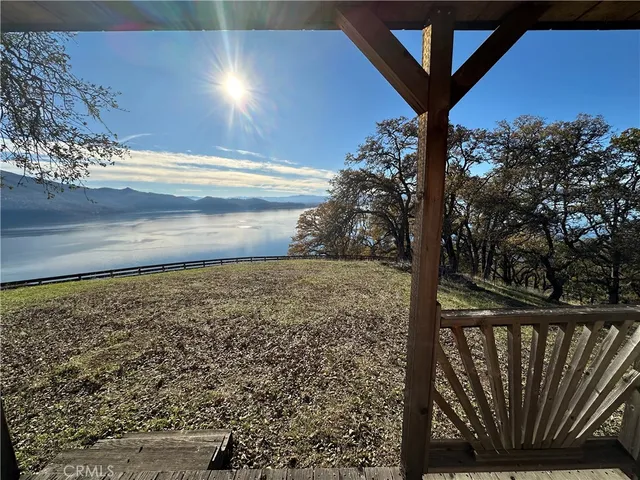 a view of a yard from a balcony