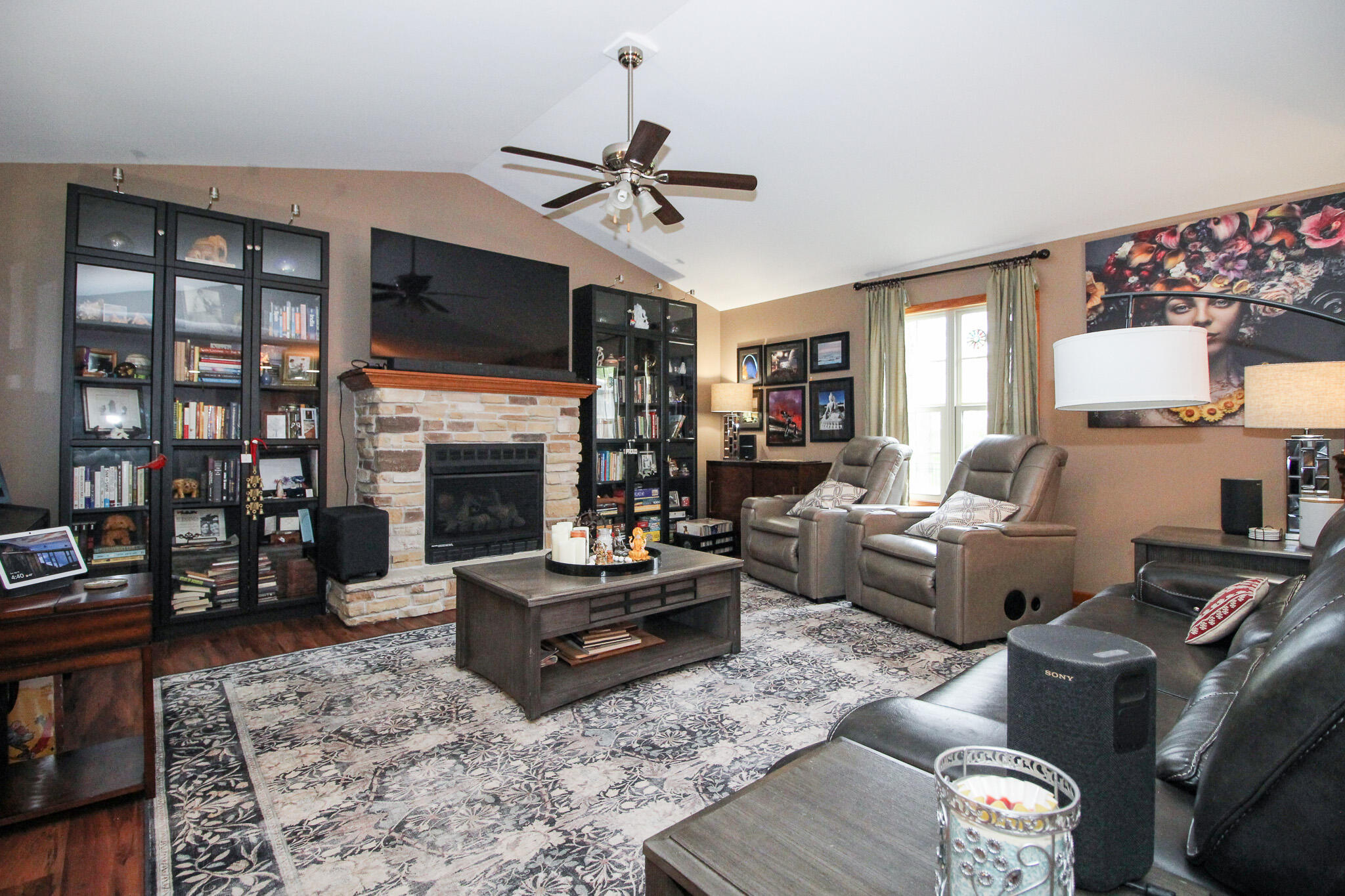 2913 Cardinal Drive Wheatfield, IN 46392 - Photo 6 of 34 a living room with furniture fireplace and a flat screen tv