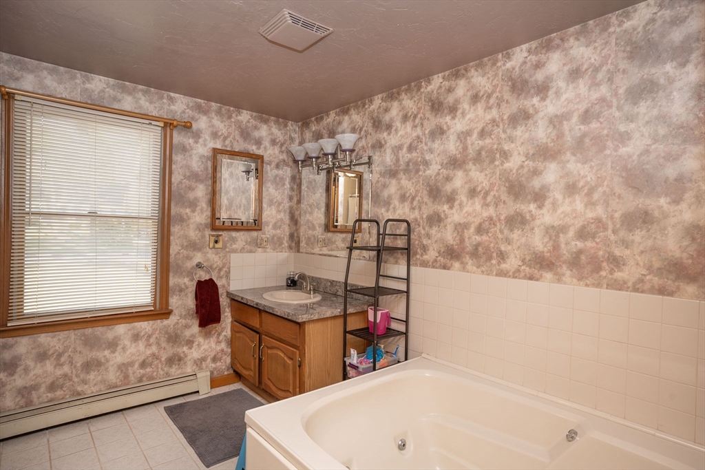 22 Dinahs Way Wareham, MA 02571 - Photo 15 of 42 a bathroom with a bathtub and shower