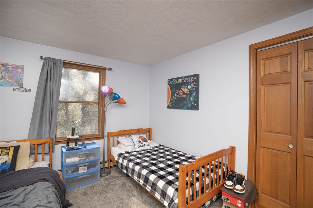 22 Dinahs Way Wareham, MA 02571 - Photo 20 of 42 a bedroom with furniture and a window