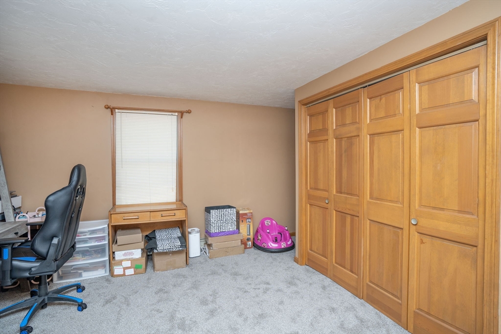 22 Dinahs Way Wareham, MA 02571 - Photo 21 of 42 a view of a room with workspace and a window