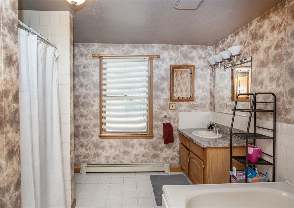22 Dinahs Way Wareham, MA 02571 - Photo 23 of 42 a living room with furniture and a window