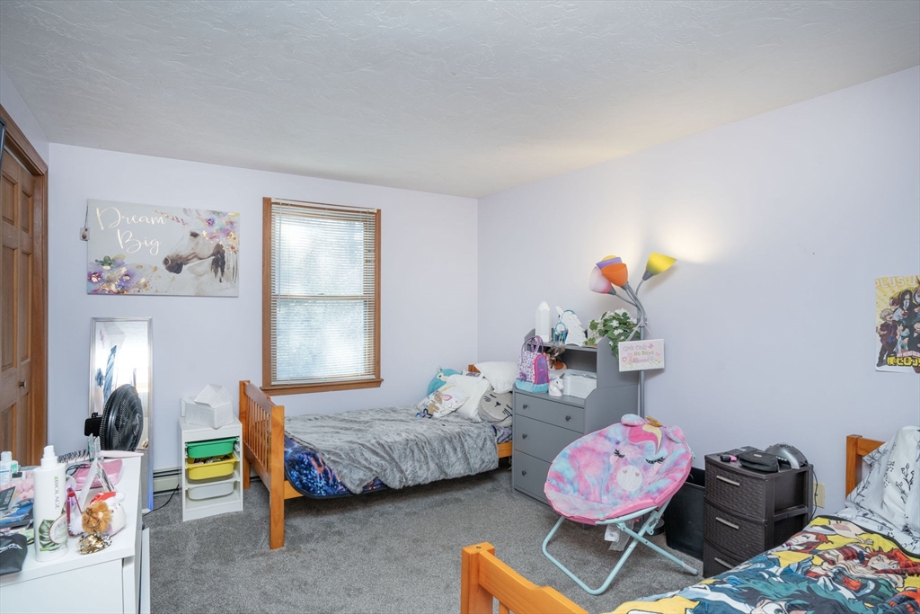 22 Dinahs Way Wareham, MA 02571 - Photo 25 of 42 a bedroom with a bed a window and dresser