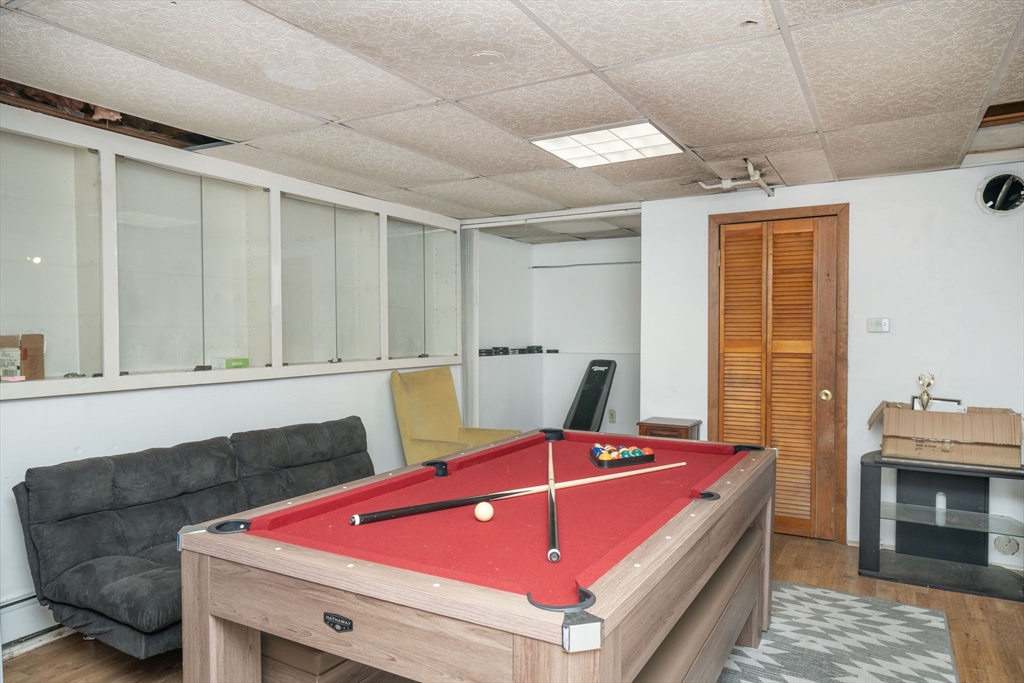 22 Dinahs Way Wareham, MA 02571 - Photo 33 of 42 a bath room with a bed and dresser