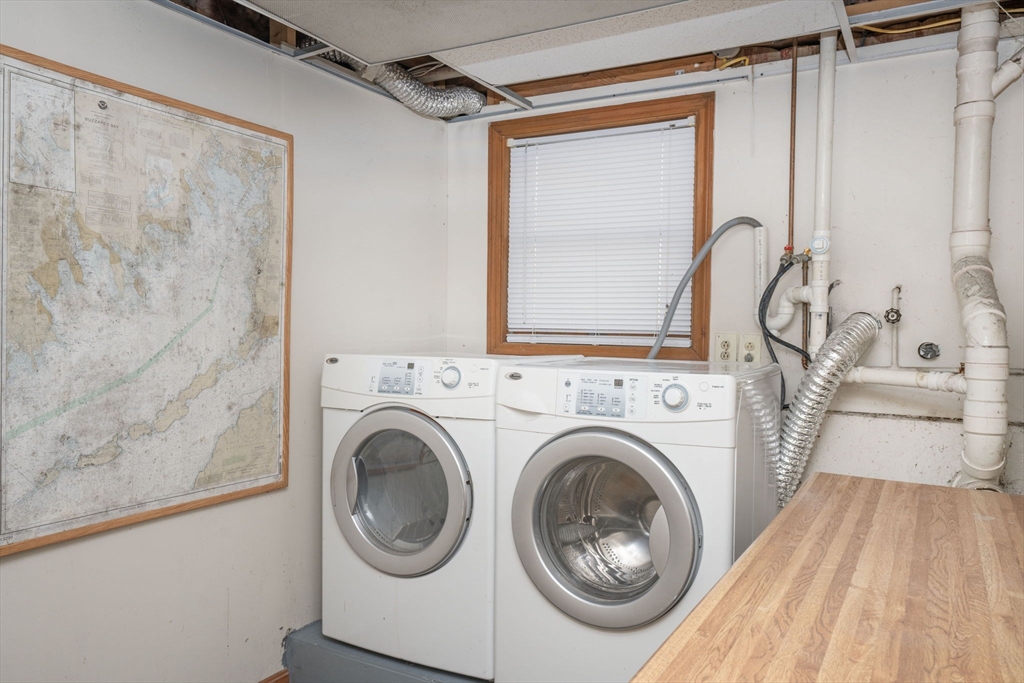 22 Dinahs Way Wareham, MA 02571 - Photo 34 of 42 a view of a storage & utility room with a washer dryer