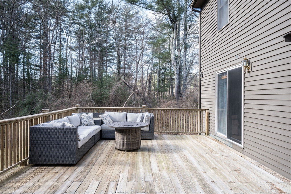 22 Dinahs Way Wareham, MA 02571 - Photo 35 of 42 a view of roof deck with couches and wooden floor
