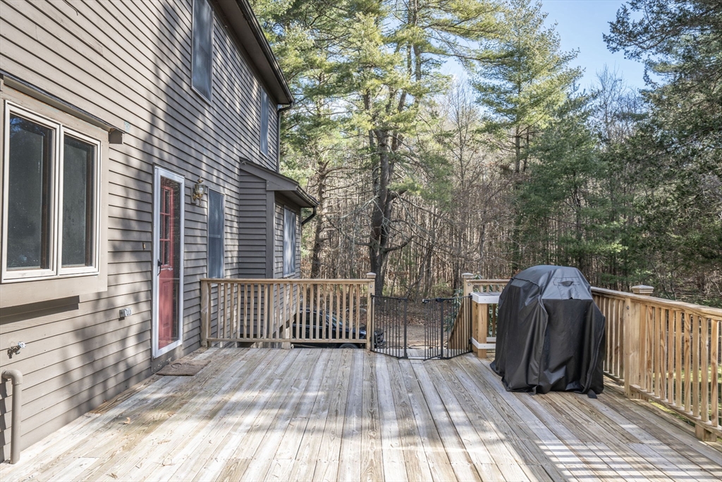 22 Dinahs Way Wareham, MA 02571 - Photo 36 of 42 a view of backyard with a deck and wooden floor