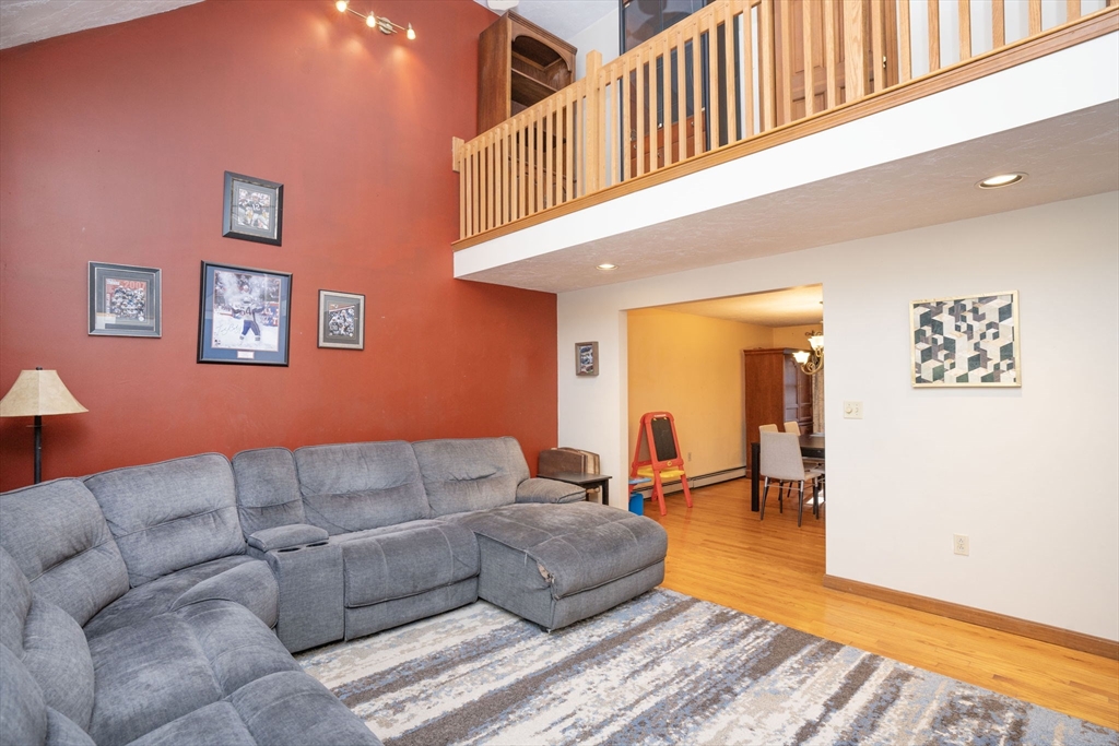 22 Dinahs Way Wareham, MA 02571 - Photo 4 of 42 a living room with furniture and a table